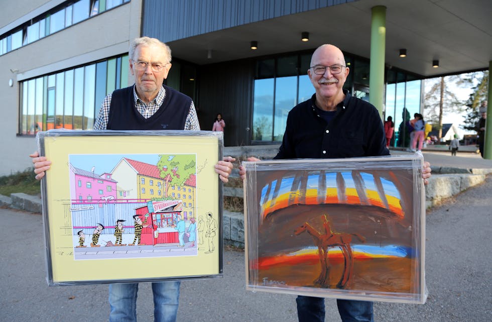 STOR BREDDE: Høybråten Lions kan tilby det meste på sin årlige kunstutstilling på Høybråten skole. Kasserer Erik Nordahl (t v) viser fram et kunstverk av Magnus Schive som har tegnet et ganske så artig motiv av den legendariske Syverkiosken på Aleksander Kiellands plass, mens leder i kunstkomiteen, Per-Kristian Petersen, viser fram et av Frans Widerbergs meget ettertraktede kunstverk. Stor forskjell i både kunstform og pris.