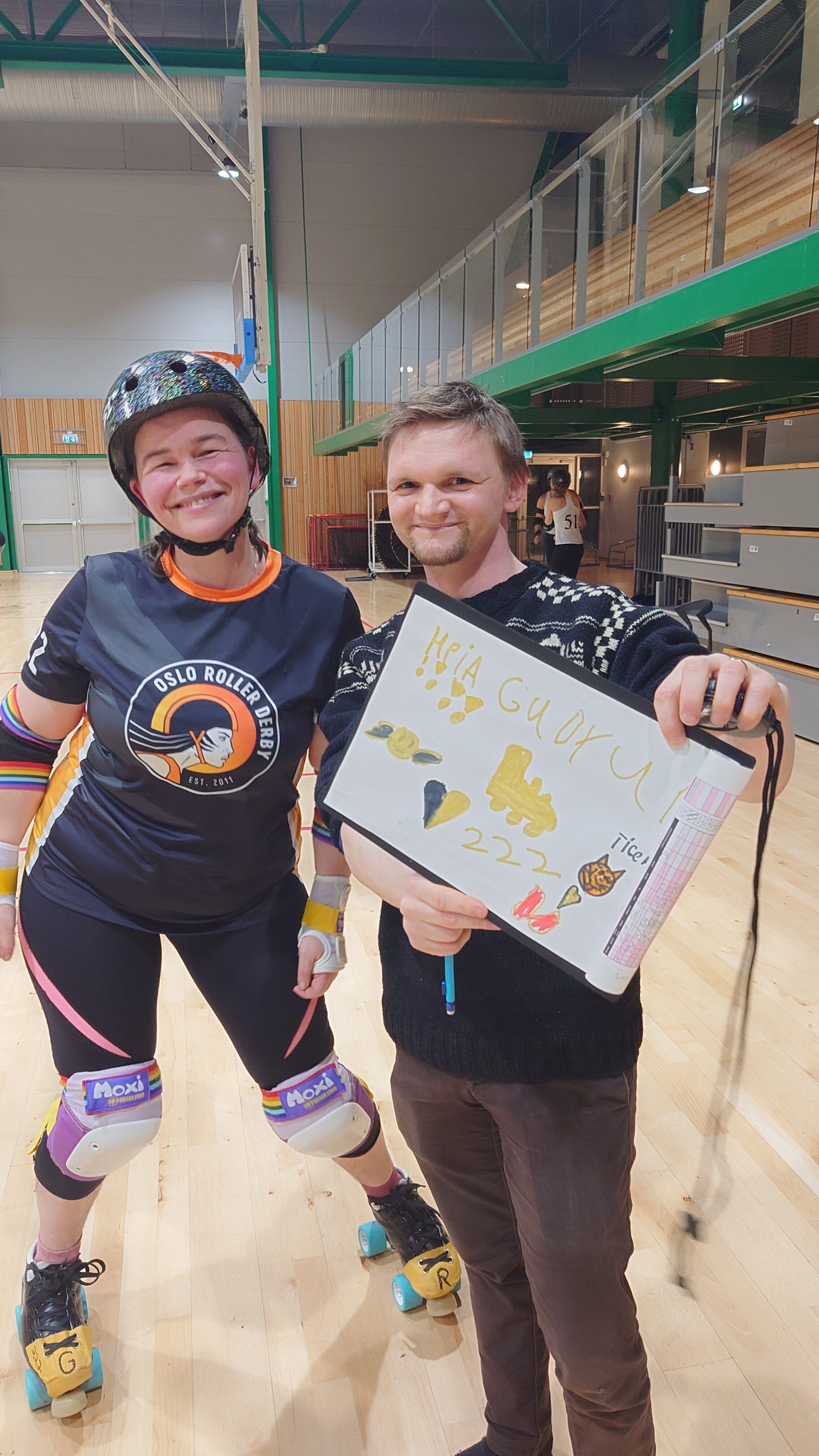 Mannen til Good Run står på sidelinjen, klar for å heie.